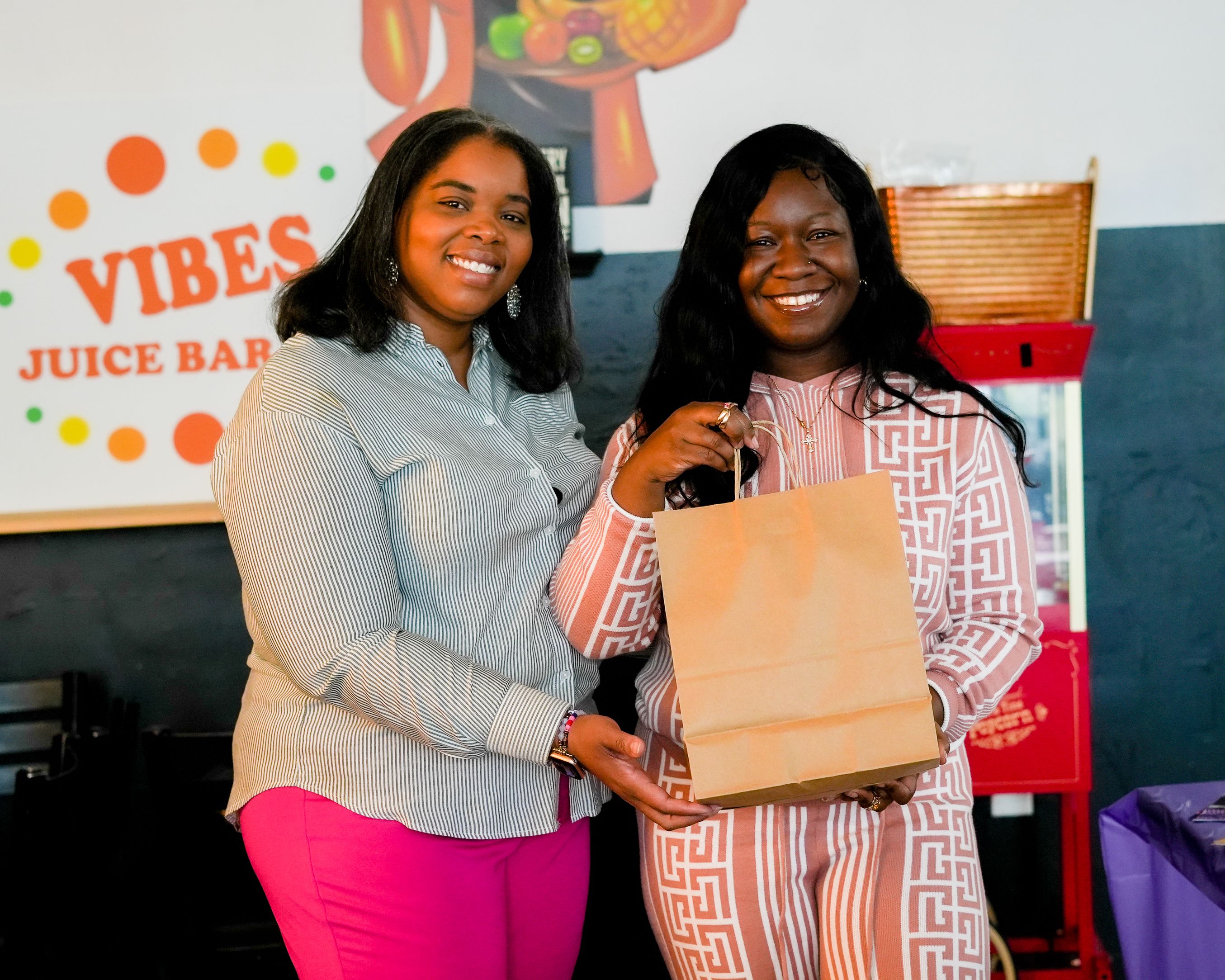 Natural XScentrics founder presenting a customer gift bag
