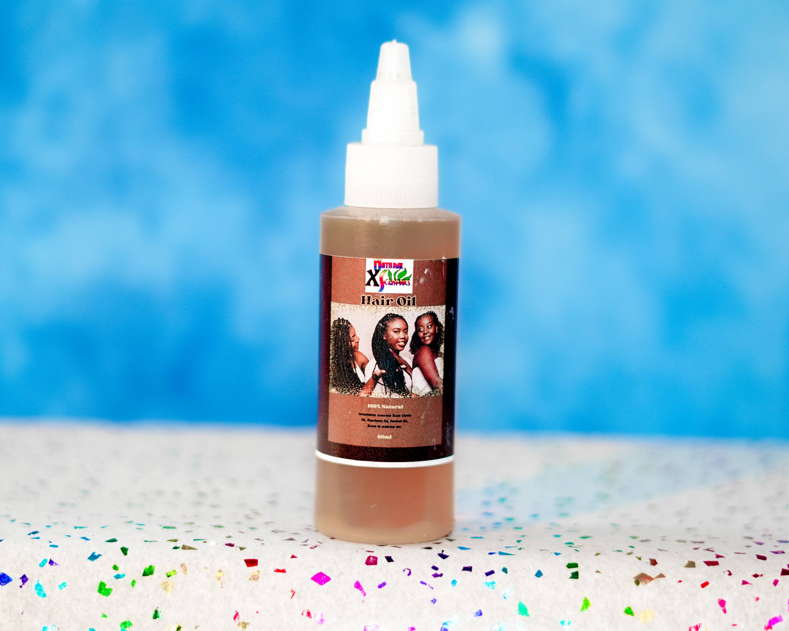 Natural XScentrics hair oil product photo
