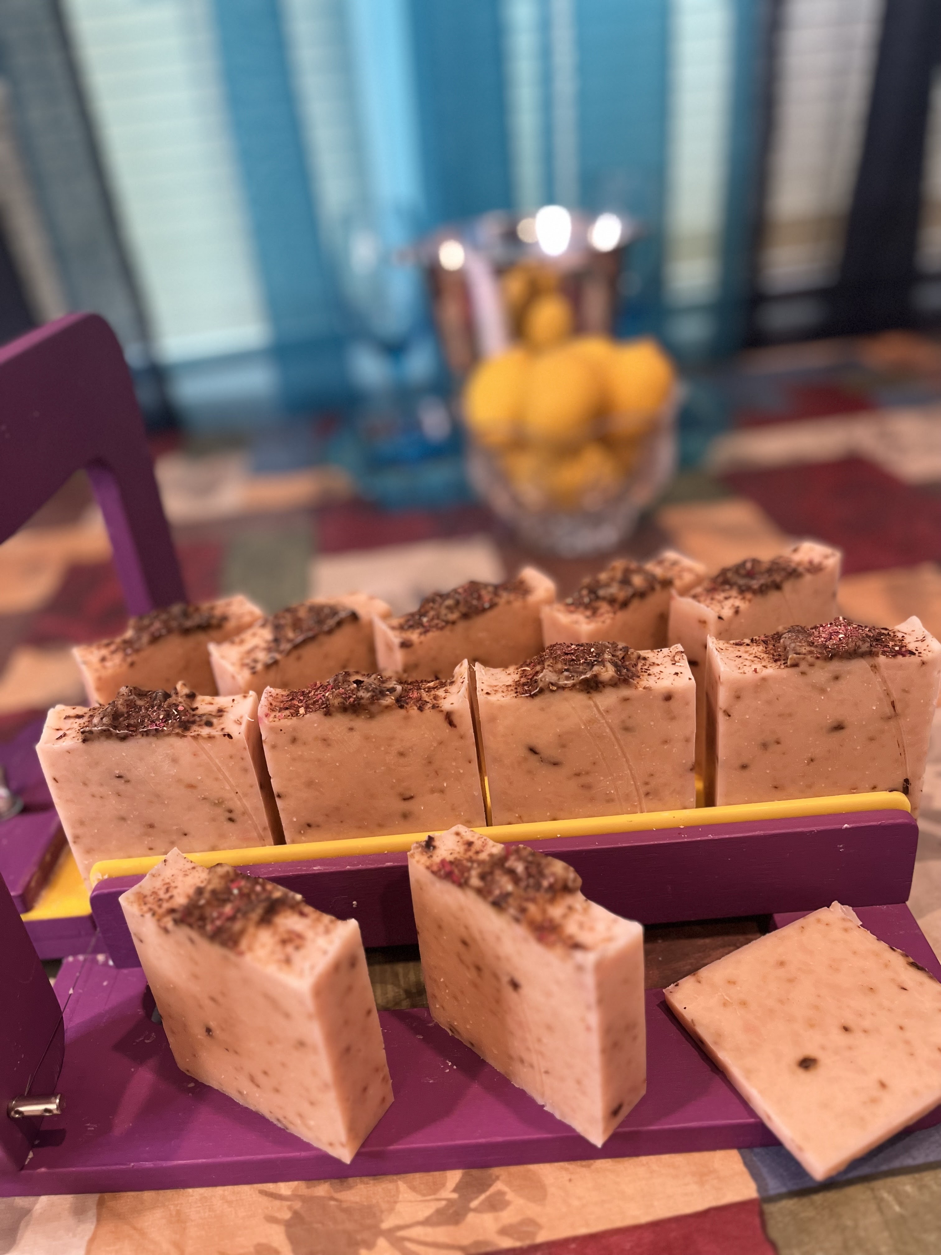 Rose Gold soap bars arranged in a wooden curing tray